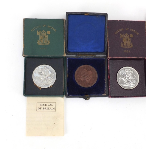 458 - Two commemorative medallions and three 1951 Festival of Britain crowns, each with fitted box