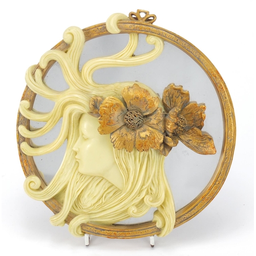 220 - Art Nouveau style gilt and ivorine maiden head mirror, 21.5cm high
