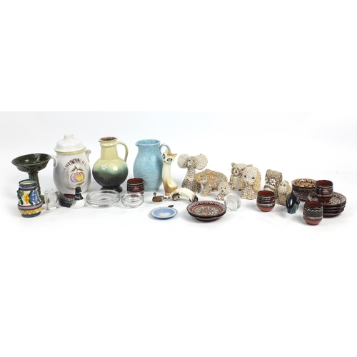 602 - China and glassware including Slipware cups and saucers, shell animals and a Western Germany rumtopf