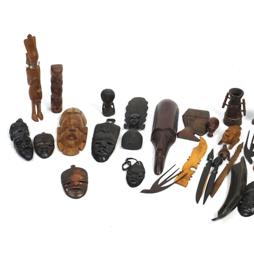 607 - African carved wood masks, figures and animals