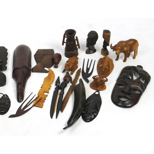 607 - African carved wood masks, figures and animals