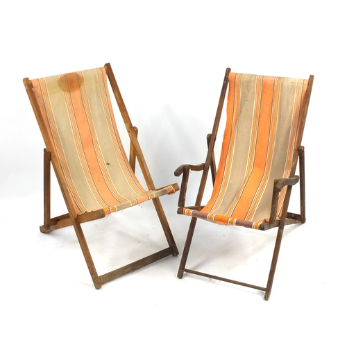 127 - Two vintage teak folding deckchairs