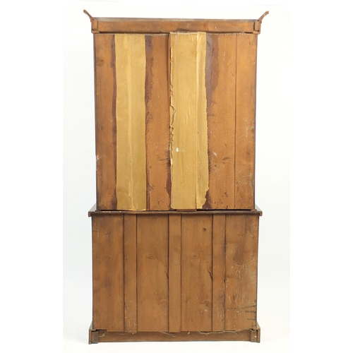 20 - Victorian mahogany display case with a pair of glazed doors, enclosing three shelves above a frieze ... 