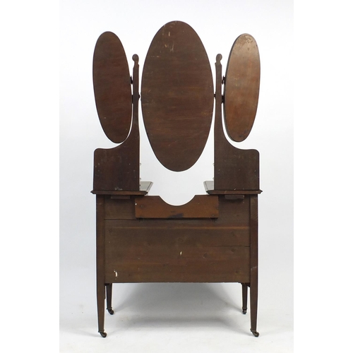 40 - Oak dressing table with triple aspect mirror above a series of six drawers, 172cm H x 92cm W x 46cm ... 