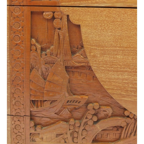 2 - Chinese camphor wood trunk carved with figures, junks and dragons, 58cm H x 100cm W x 50cm D