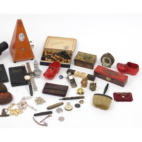 423 - Objects including a metronome, wristwatches, costume jewellery and a spotting scope