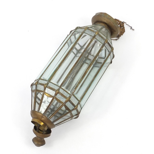 585 - Antique Moroccan lantern with bevelled glass panels, 70cm in length