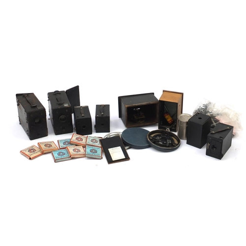 605 - Vintage cameras, film reels and accessories including Kodak Brownie's and Pathescope