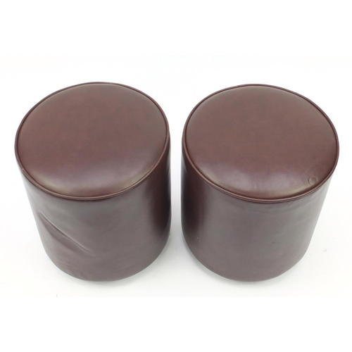 31 - Pair of cylindrical brown leather stools by RHA furniture, each 45cm high x 39cm in diameter