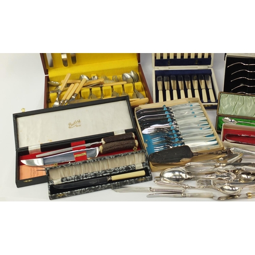 253 - Mostly silver plated and stainless steel cutlery including some cased sets and a canteen