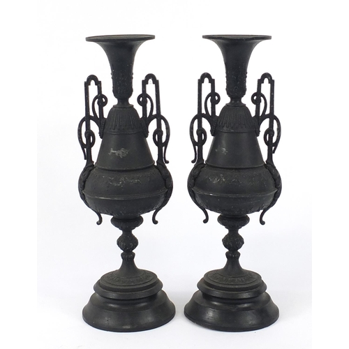 159 - Pair of classical design urn candlesticks with twin handles, each 37cm high
