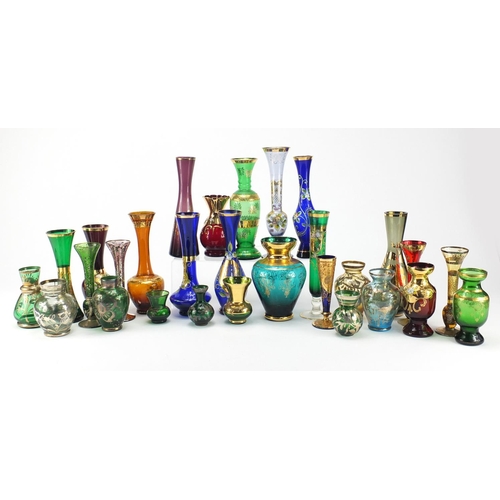 257 - Colourful glass vases, some with silver overlay and hand painted with flowers, the largest 21cm high