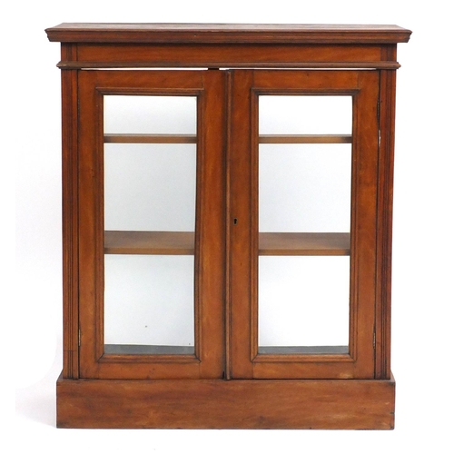 105 - Victorian mahogany bookcase fitted with a pair of glazed doors, enclosing two adjustable shelves, 94... 