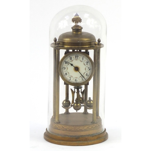 558 - Brass Anniversary clock with enamelled dial, marked made in Germany to the movement, with glass dome... 