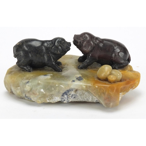 463 - Soapstone carving of two pigs, 14cm wide