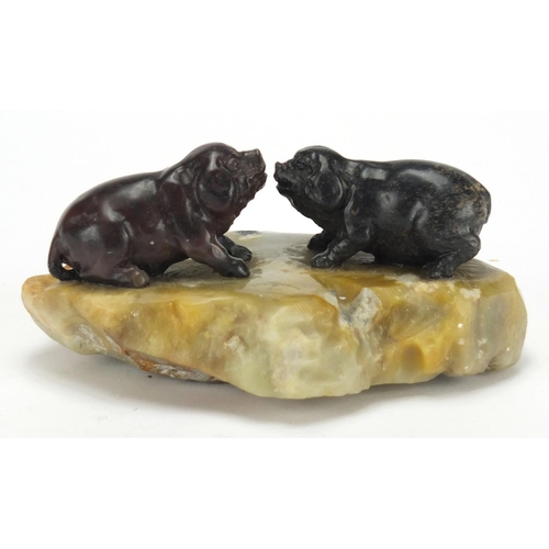 463 - Soapstone carving of two pigs, 14cm wide