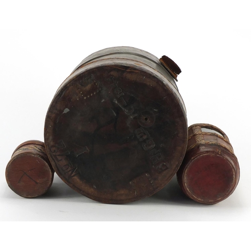 568 - Military interest leather bucket together with a tribal flask and container, the bucket 30cm high