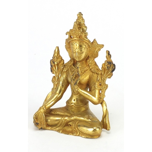 407 - Tibetan gilt metal deity, 11cm high