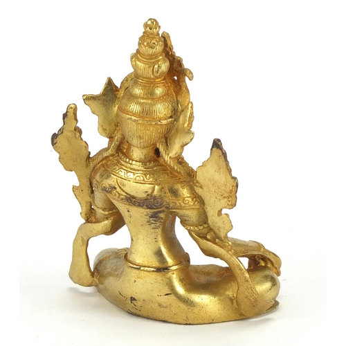 407 - Tibetan gilt metal deity, 11cm high