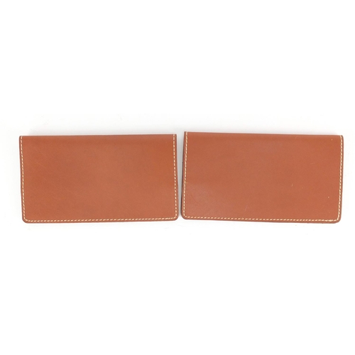 437 - Two leather Rolex certificate wallets