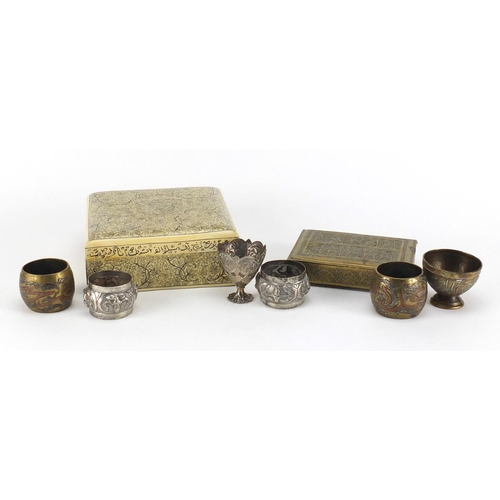 421 - Middle Eastern objects including a Persian lacquered box, Cairo Ware napkin rings and egg cup, and a... 