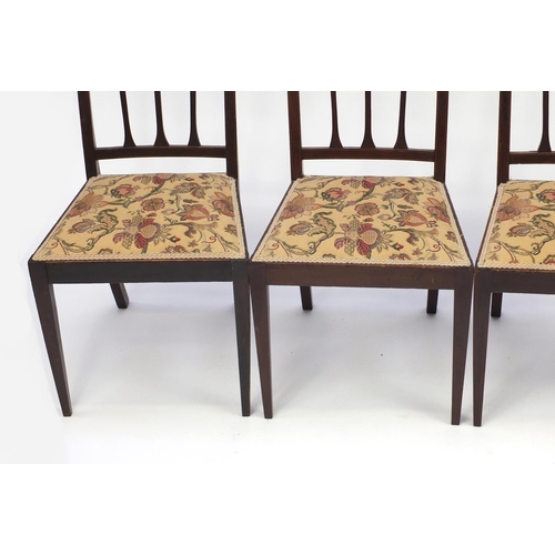 68 - Set of six Edwardian inlaid mahogany dining chairs including a carver, with floral upholstered seats... 