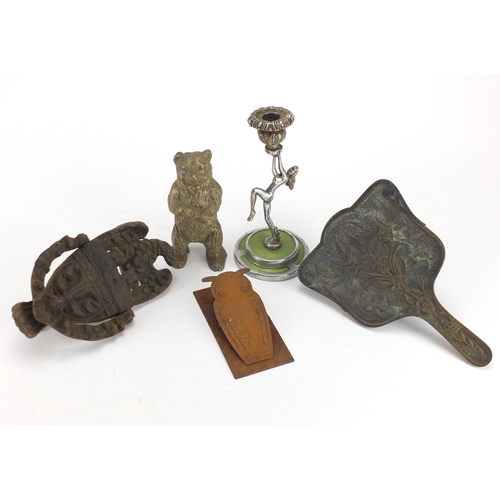 584 - Metalwares including an Art Deco nude female candlestick, Victorian door knocker and an owl letter c... 