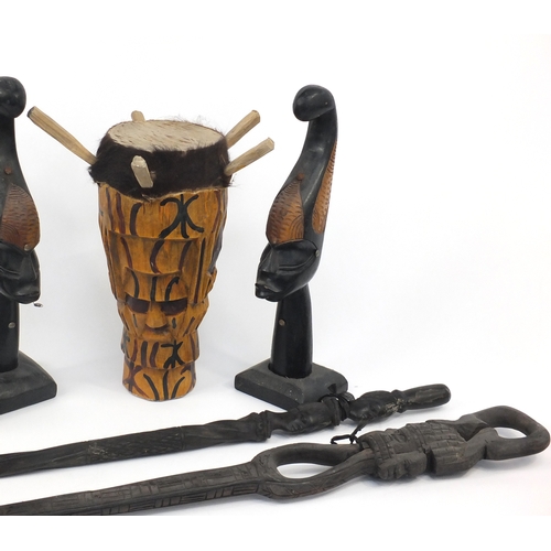 629 - African carved wood items including a pair of busts and drum
