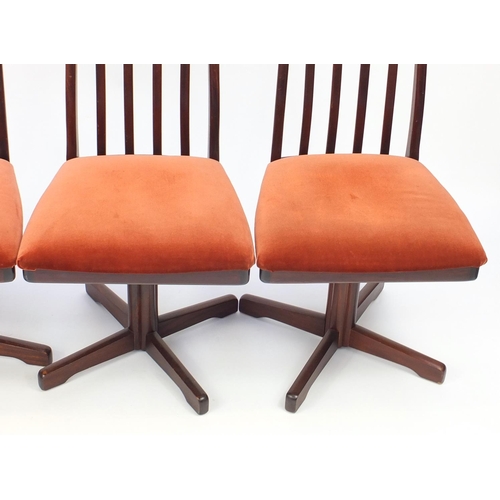 8 - Set of eight Vintage Rosewood swivel dining chairs, reputably retailed by Waring & Gillow, each 103c... 