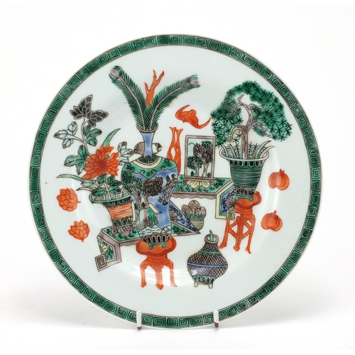 2134 - Chinese porcelain plate hand painted in the famille verte palette with objects, 23cm in diameter
