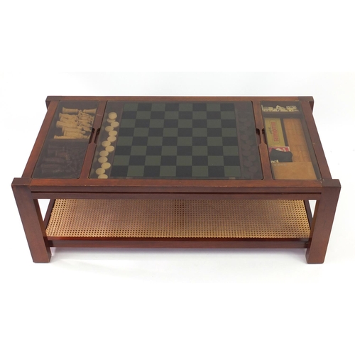 2037 - Mahogany games coffee table with glass top and Bergère under tier, 44cm H x 120cm W x 60cm D