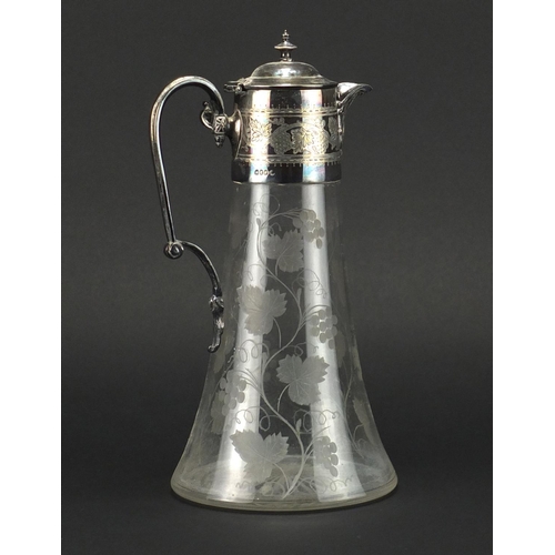 2132 - Victorian glass claret jug with silver plated mounts by Hukin & Heath, the body etched with fruiting... 