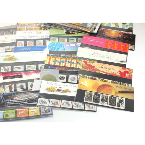 2337 - Collection of Royal Mint presentation packs, various genres and denominations
