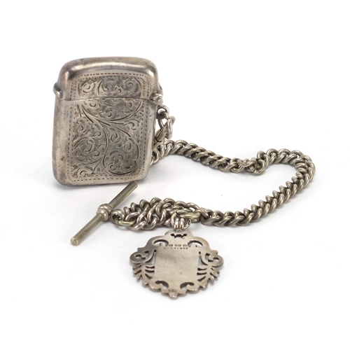 2360 - Silver vesta and sports jewel on a white metal chain, the vesta Birmingham hallmarked, approximate w... 