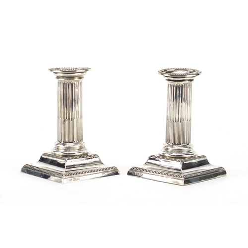 2354 - Pair of Victorian silver square based column candlesticks by Hawksworth, Eyre & Co Ltd Sheffield 189... 