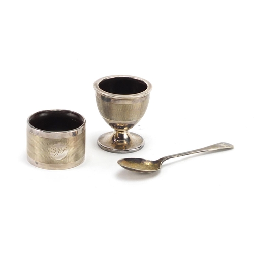 2368 - Silver egg cup, spoon and napkin ring Christening set, with engine turned decoration by Joseph Glost... 