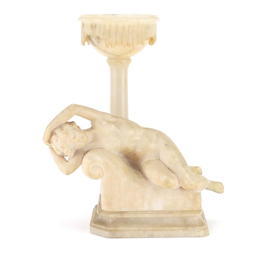 2283 - Alabaster table lamp modelled as a reclining nude lady on a chaise lounge, 35cm high