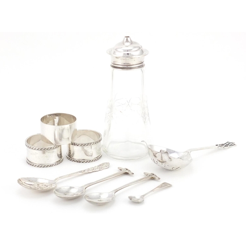 2357 - Silver items comprising pair of Mappin & Webb tortoise teaspoons, three napkin rings, sifting spoons... 