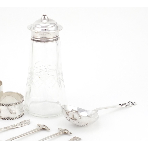 2357 - Silver items comprising pair of Mappin & Webb tortoise teaspoons, three napkin rings, sifting spoons... 