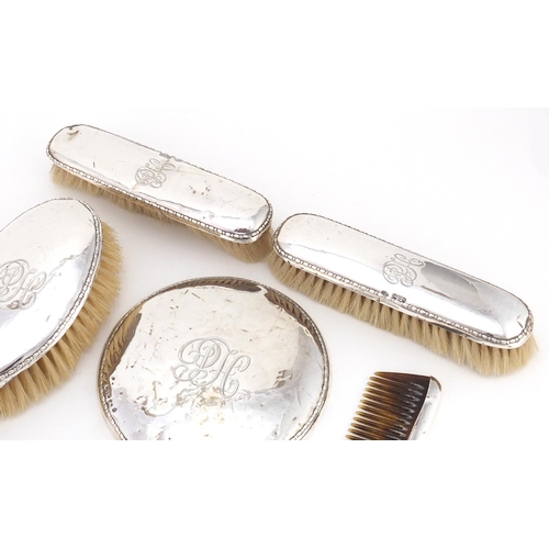2371 - Silver five piece dressing table set including hand mirror and brushes, various Chester hallmarks, t... 