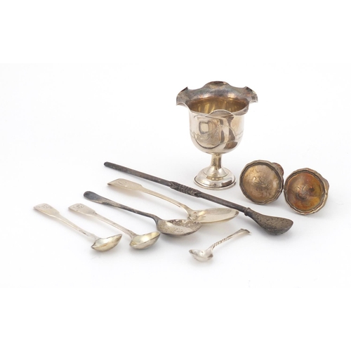 2370 - Georgian and later silver including an unmarked cup, teaspoons, bottle stoppers and a silver coloure... 