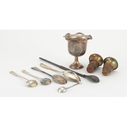 2370 - Georgian and later silver including an unmarked cup, teaspoons, bottle stoppers and a silver coloure... 