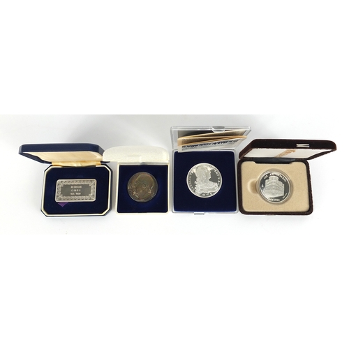 2329 - Five silver coins and medallions including Den Norske creditbank, four with fitted cases