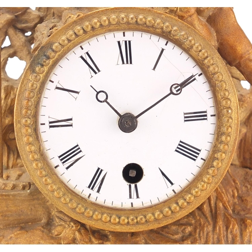 2110 - French gilt metal mantel clock mounted with a figure, the enamelled dial with Roman numerals, 32cm h... 