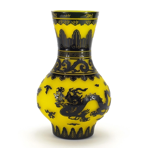 2286 - Chinese Peking glass vase, overlaid with two dragons chasing the flaming pearl amongst clouds, 26cm ... 