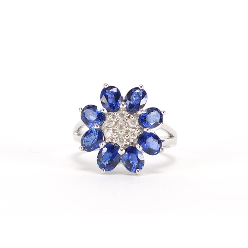 2473 - 9ct white gold blue stone and diamond flower head ring, size N, approximate weight 5.5g