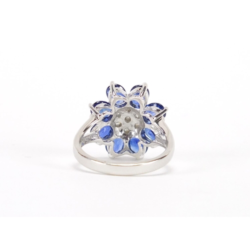 2473 - 9ct white gold blue stone and diamond flower head ring, size N, approximate weight 5.5g