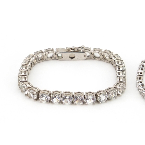2487 - Two silver bracelet including cubic zirconia, each 18cm in length, approximate weight 44.3g