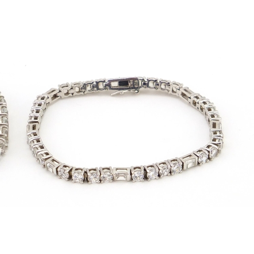 2487 - Two silver bracelet including cubic zirconia, each 18cm in length, approximate weight 44.3g