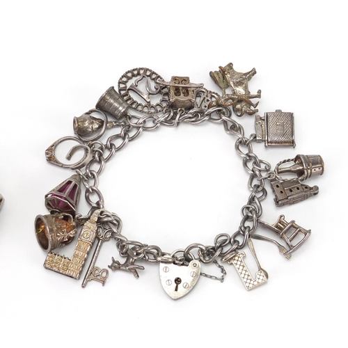 2437 - Silver charm bracelet with a selection of mostly silver charms and a silver gate bracelet, approxima... 